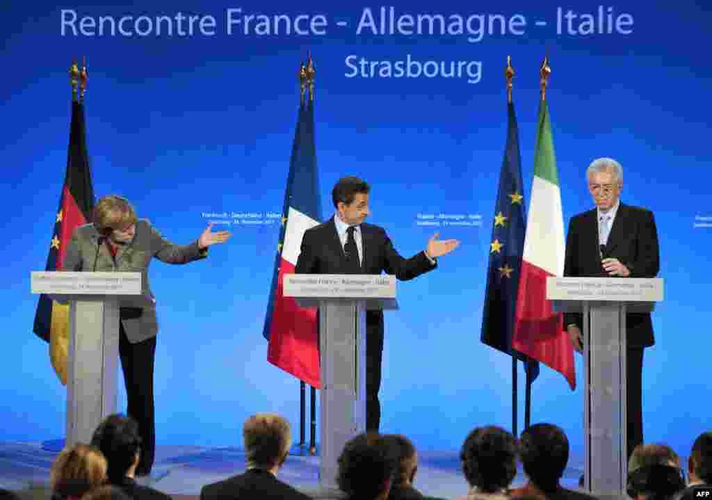 Francuska - Njemačka kancelarka Angela Merkel, francuski predsjednik Nicolas Sarkozy i premijer Italije Mario Monti na konferenciji za novinare, Strasbourg, 24.11.2011. Foto: AFP / Eric Feferberg