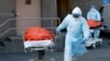 انتقال اجساد قربانیان کرونا در نیویورک 