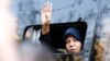 Faezeh Hashemi greets supporters and people attending the funeral of her father, Akbar Hashemi Rafsanjani, in Tehran on January 10, 2017. She has faced pressure for criticizing the system that her father helped establish.