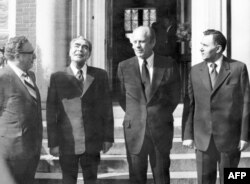 Soviet leader Leonid Brezhnev (second from left) visits the U.S. Embassy in Helsinki with U.S. President Gerald Ford (second from right) during talks that resulted in the Helsinki Accords in July 1975. Also pictured: U.S. Secretary of State Henry Kissinger (left) and Soviet Foreign Minister Andrei Gromyko.