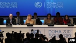 Delegates at the opening ceremony of the 18th United Nations climate change conference in Doha on November 26.