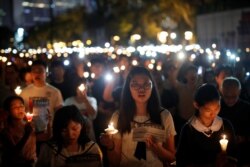 Акція пам’яті про жертв протестів на площі Тяньаньмень, яку до 30-ї річниці подій провели у Гоноконзі