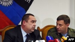 Qondarma Donetsk və Luqansk respublikalarının rəhbərləri Alexander Zakharchenko və Igor Plotnitsky.