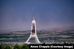 The statue of Niyazov, atop the Monument of Neutrality. The structure was once in central Ashgabat, where the golden statue rotated to always face the sun.