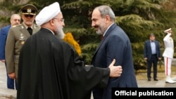 Iran - Iranian President Hassan Rouhani greets Armenian Prime Minister Nikol Pashinian in Tehran, February 27, 2019.