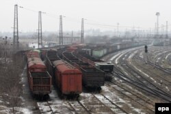 Empty coal wagons parked near a metallurgical plant in separatist-controlled territory in the Donetsk region, where deliveries from Ukrainian suppliers have been disrupted recently. (file photo)