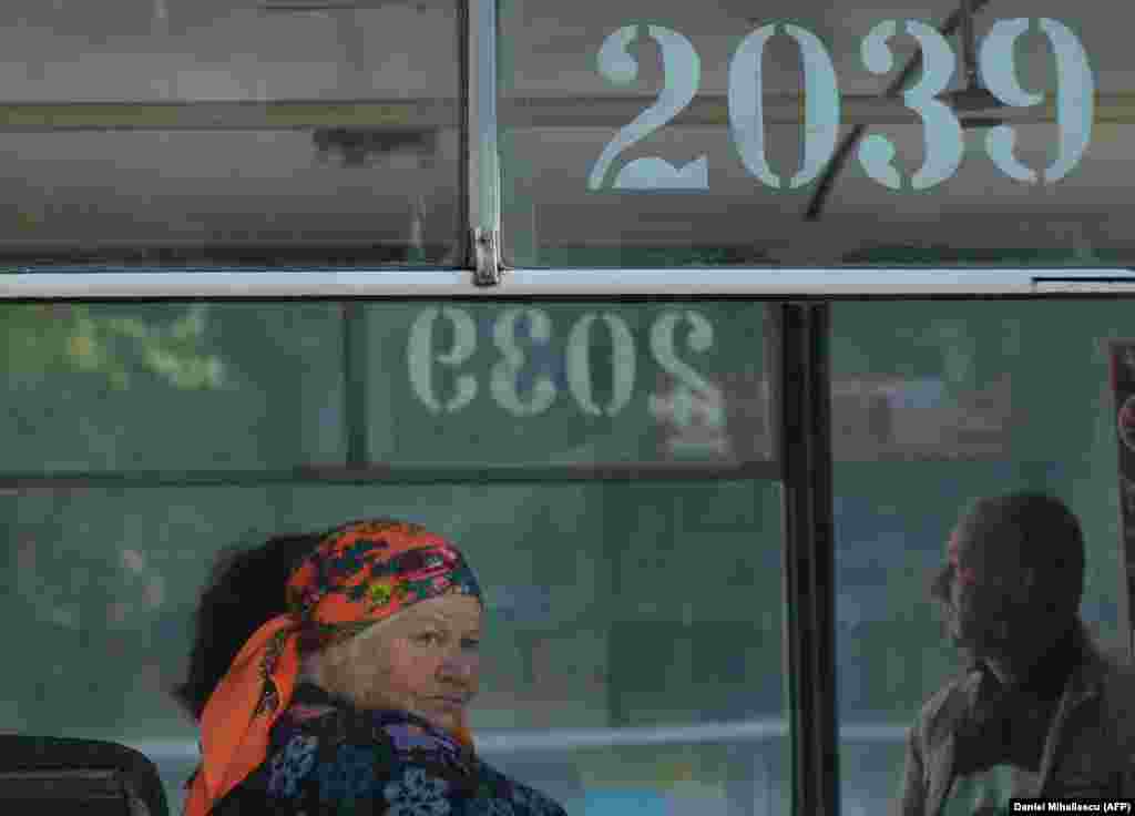 Passengers ride a trolleybus in Chisinau.