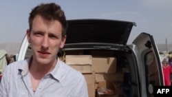 A family handout photo of American Kassig, who became an aid worker and later converted to Islam, prior to his capture by militants in Syria in 2013