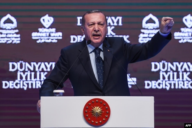 Turkish President Recep Tayyip Erdogan gestures as he addresses supporters in Istanbul on March 12.