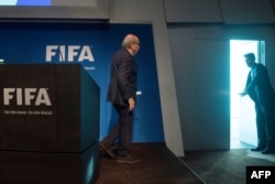 Sepp Blatter leaves after a press conference announcing his resignation in Zurich on June 2.