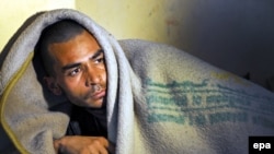 یک معتاد مواد مخدر در افغانستان