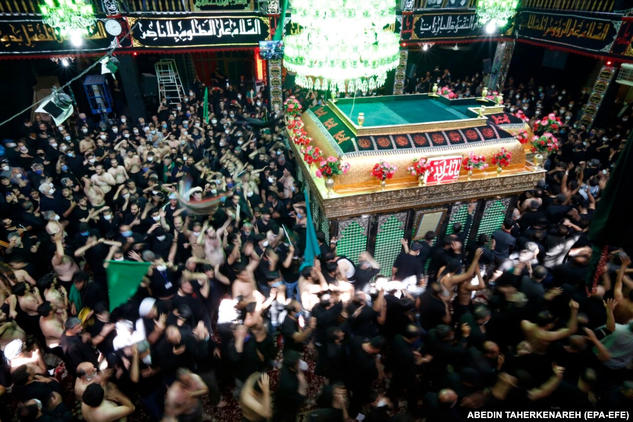 Crowds packed in the Kerbala mosque in Tehran.&nbsp;Iranian President Hassan Rohani was under pressure from hard-liners who opposed any limits on religious ceremonies or the closing of shrines due to the pandemic.