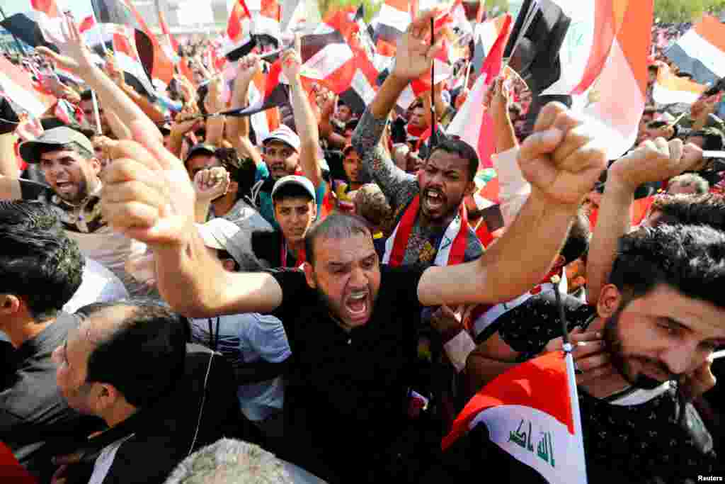 Supporters of Iraqi Shi&#39;ite cleric Moqtada al-Sadr shout slogans during a protest against corruption on Tahrir Square in Baghdad on July 15. (Reuters/Khalid al-Mousily)