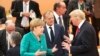 ԱՄՆ նախագահ Դոնալդ Թրամփը, Գերմանիայի կանցլեր Անգելա Մերկելը և Եվրամիության խորհրդի նախագահ Դոնալդ Տուսկը Մեծ քսանյակի գագաթնաժողովում, Համբուրգ, 8-ը հուլիսի, 2017թ․