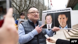 Detalj sa protesta u Vankuveru kojim se zahteva da Kina oslobodi Michaela Spavora i Michaela Kovriga mart 2019.