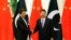 FILE: Chinese President Xi Jinping met Pakistani Prime Minister Imran Khan at the Great Hall of the People in Beijing in November.