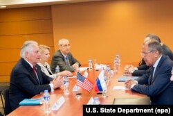 U.S. Secretary of State Rex Tillerson (front left) and Russian Foreign Minister Sergei Lavrov (front right) meet in Manila on August 6.