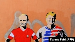 Mural sa likovima ruskog predsjednika Vladimira Putina i američkog Donalda Trumpa u Rimu