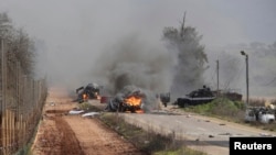 Իսրայել - Լիբանանի հետ սահմանին շարասյան վրա հարձակման հետևանքով այրվող ավտոմեքենաներ, 28-ը հունվարի, 2015թ․