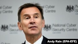 U.K. -- British Foreign Secretary Jeremy Hunt delivers a speech during a conference on Cyber Security in central London, May 23, 2019