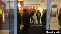 Police search the offices of Open Russia in Moscow on April 27.