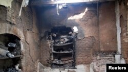 Burnt rooms inside a prison are seen following a Taliban attack on a prison in Dera Ismail Khan last year.