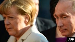 Ангела Меркел ва Владимир Путин