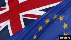 U.K. -- The EU and the Union flags fly outside The European Commission Representation in the United Kingdom in central London, 23Jan2013