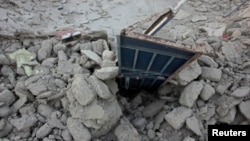 Պակիստան - Երկրաշարժի հետևանքով փլատակների վերածված շինություններ Ավարան բնակավայրում, 25-ը սեպտեմբերի, 2013թ․