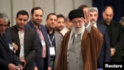 Iran's Supreme Leader Ayatollah Ali Khamenei arrives to cast his vote at a polling station during parliamentary elections in Tehran, Iran February 21, 2020