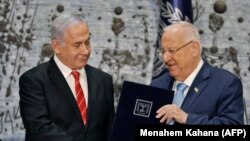 Իսրայելի գործող վարչապետ Բենյամին Նեթանյահուն նախագահ Ռեուվեն Ռիվլինից ստանում է կառավարություն կազմելու լիազորություն, Երուսաղեմ, 25-ը սեպտեմբերի, 2019թ. 