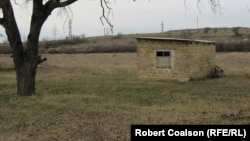 Crimea's Tatars build small structures on plots they don't have rights to while they fight for ownership.