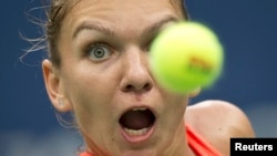 Simona Halep helped Romania upset the Czech Republic and advance in the Fed Cup tennis tournament. (file photo)