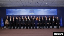 European Union leaders pose for a photo at the EU summit in Brussels on October 18.