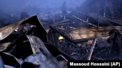 The scene of a fire at an electronic appliances market in Kabul
