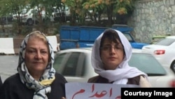 Giti Pourfazel (L) with another prominent women's rights defender, Nasrin Sotoudeh who is currently serving a long prison term for protesting forced hijab. File photo