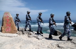 Морская пехота ВС КНР на спорных Парасельских островах к юго-западу от Тайваня, которые в Пекине также считают "неотъемлемой частью КНР". Март 2021 года