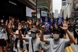 Під час демонстрації проти нового закону про держбезпеку в Гонконзі, 24 травня 2020 року
