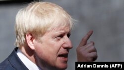 Premieul B Boris Johnson gives a speech outside 10 Downing Street in London, July 24, 2019