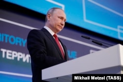 Russian President Vladimir Putin delivers a speech in Arkhangelsk on March 30.