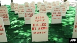 Activists erected a mock graveyard across from the United Nations to highlight the need for an arms treaty.