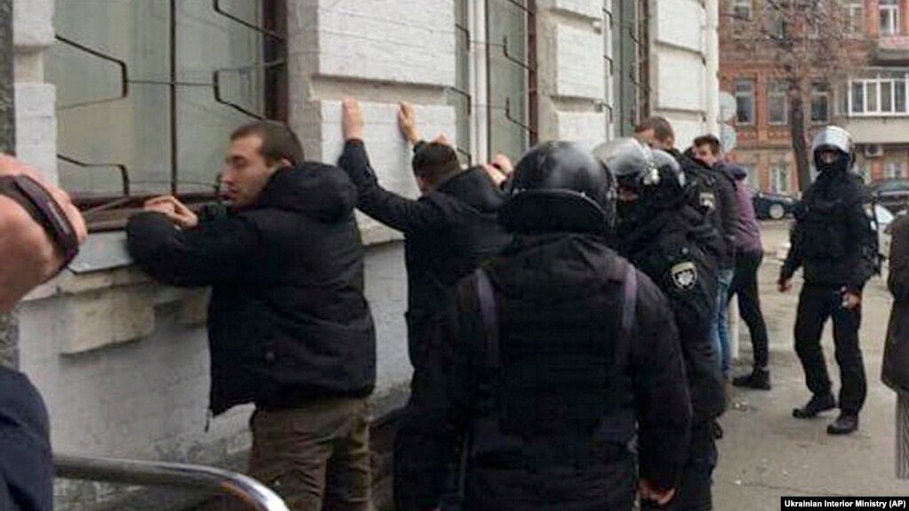 Police detain far-right activists in Kyiv on February 9.