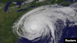 Hurricane Irene rages ashore in North Carolina.