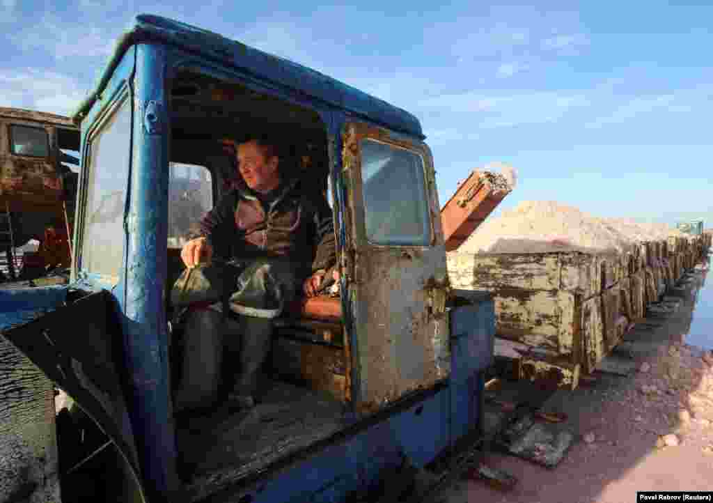 A train driver hauls in a load of salt.&nbsp;