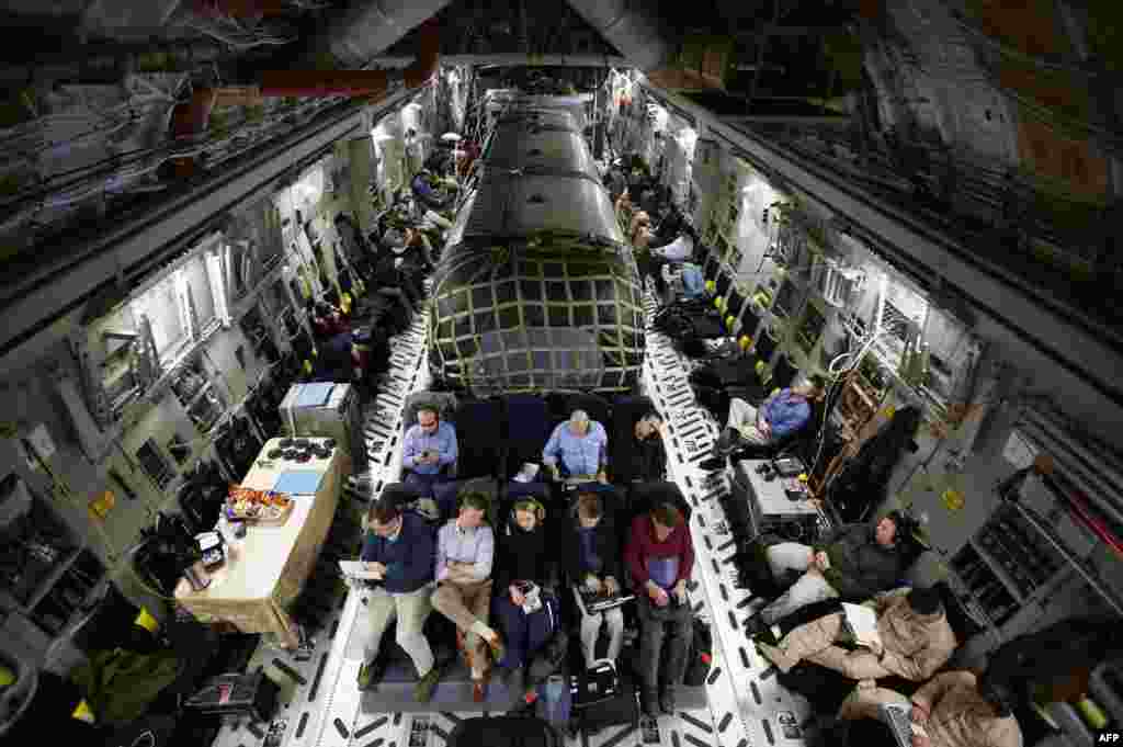 The "Silver Bullet" airstream trailer (center) carrying U.S. Secretary of Defense Chuck Hagel is pictured inside a U.S. Air Force C-17 aircraft transporting him and his staff from Kabul to Ramstein air base in Germany. (AFP/Jason Reed)