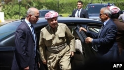 The president of Iraq's autonomous Kurdistan region, Masud Barzani, arrives for a session of the regional parliament in Irbil on July 3.