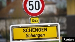 Luxembourg -- A street sign marks the beginning of the village of Schengen, January 27, 2016