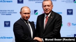 Russian President Vladimir Putin (left) and Turkish leader Recep Tayyip Erdogan plan to meet again 'soon.'
