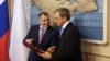 Crimean parliament speaker Vladimir Konstantinov (L) speaks with French right wing UMP party member of parliament Thierry Mariani at the State Council in Simferopol, Crimea, July 23, 2015