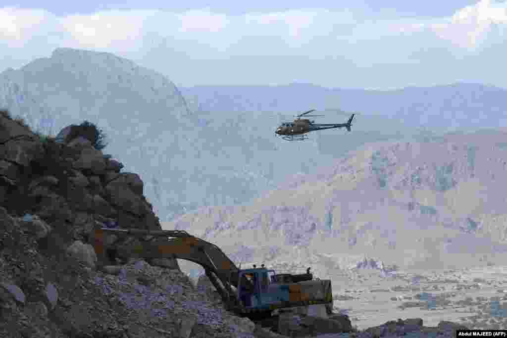 A military helicopter takes part in a rescue search for miners on September 8, a day after the mine collapsed.&nbsp;